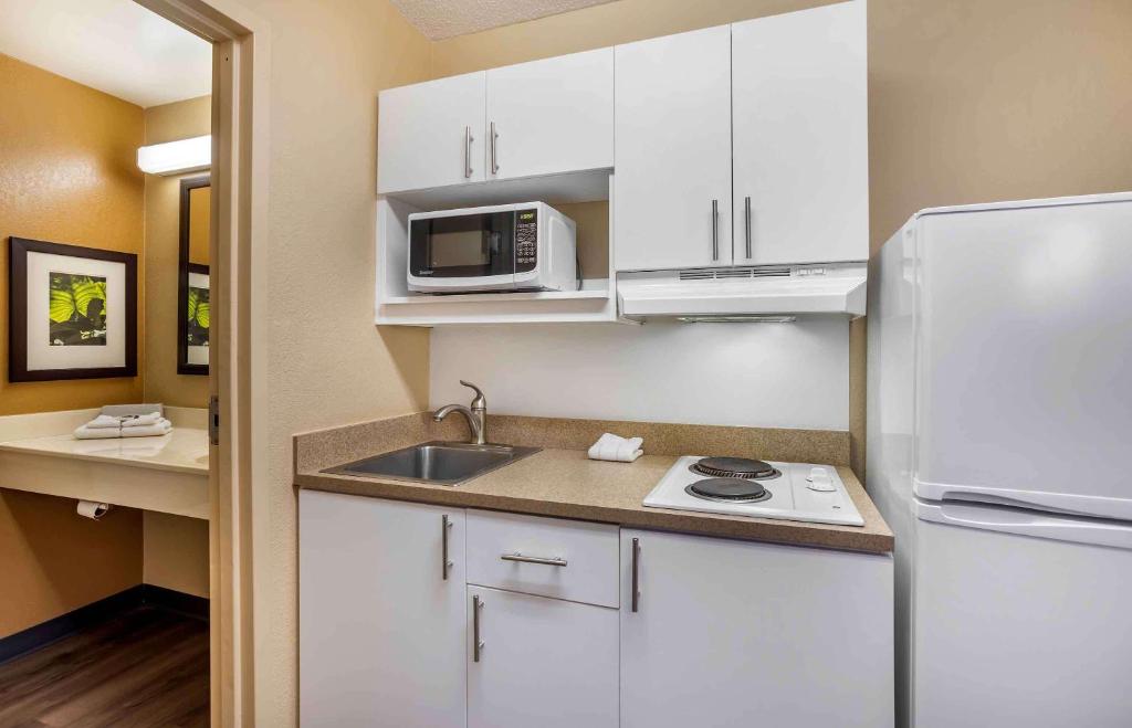 Kitchenette with refrigerator and microwave